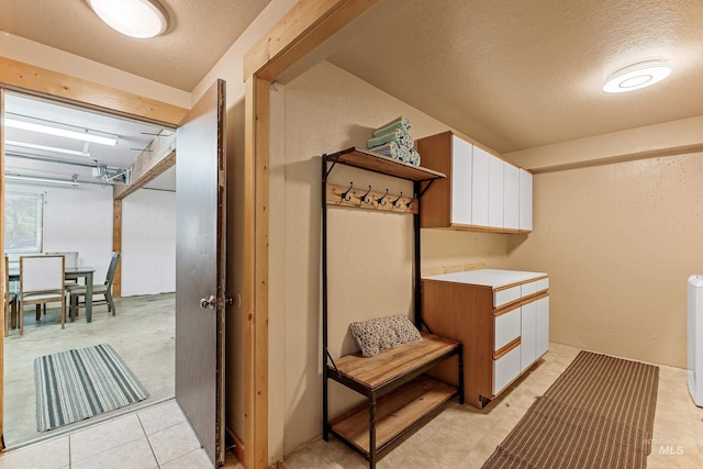 305 Gabi Ln, Mccall, ID 83638 - clothes washing area featuring a textured ceiling and laundry area