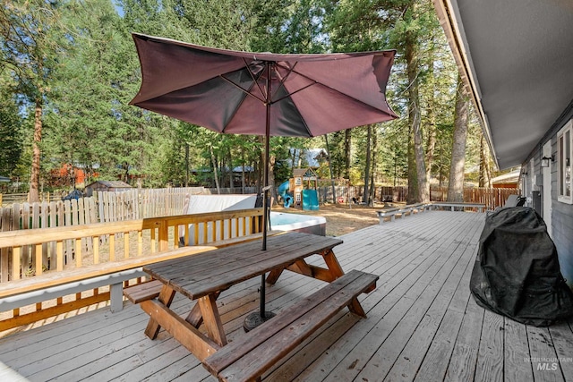 305 Gabi Ln, Mccall, ID 83638 - deck with a fenced backyard and a playground