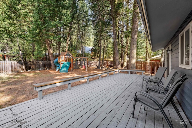 305 Gabi Ln, Mccall, ID 83638 - wooden deck featuring a fenced backyard and a playground