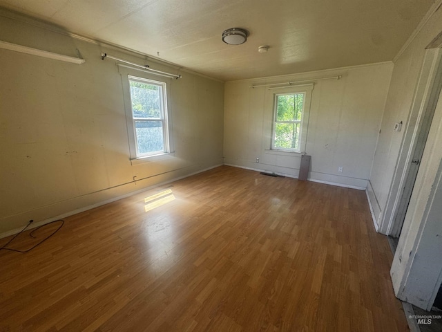 0203 22nd St, Lewiston, ID 83501 - unfurnished room with wood finished floors and baseboards