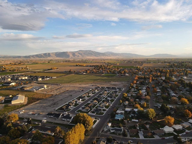 drone / aerial view featuring a mountain view