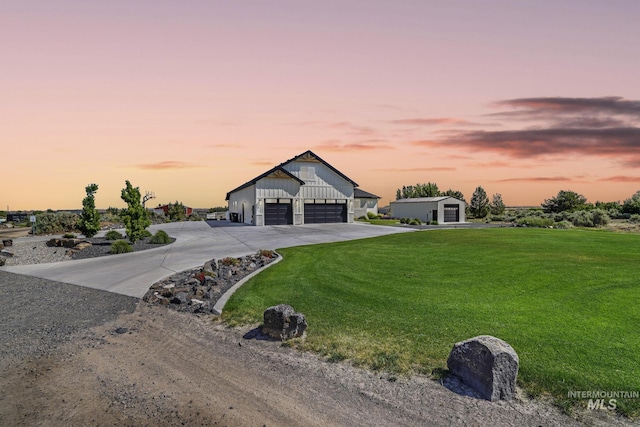 4064 China Ridge Dr, Kimberly, ID 83341 - modern farmhouse style home with concrete driveway, a front lawn, an outbuilding, and a detached garage