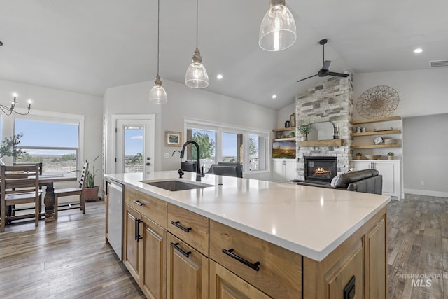 4064 China Ridge Dr, Kimberly, ID 83341 - kitchen featuring a sink, ceiling fan, stainless steel dishwasher, lofted ceiling, and wood finished floors
