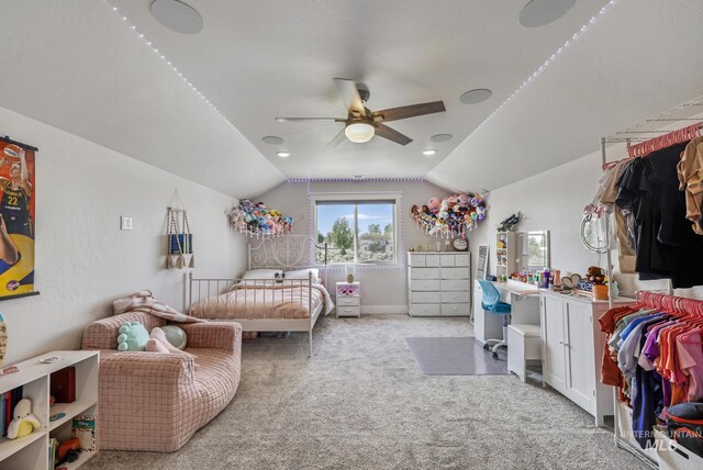 4064 China Ridge Dr, Kimberly, ID 83341 - bedroom featuring light carpet, vaulted ceiling, and a ceiling fan