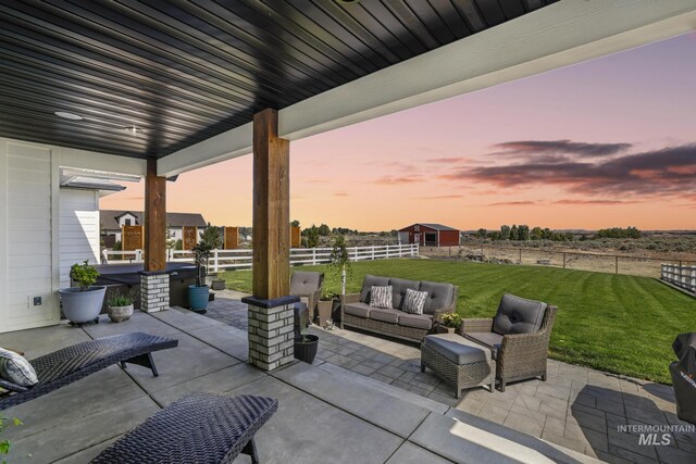 4064 China Ridge Dr, Kimberly, ID 83341 - patio terrace at dusk with an outdoor hangout area and a patio