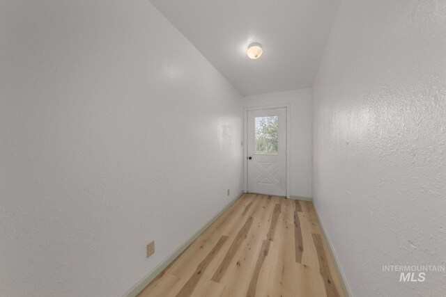 2445 Orchard Rd, Council, ID 83612 - corridor featuring light wood-style floors and baseboards