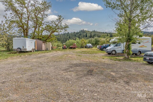 2445 Orchard Rd, Council, ID 83612 - view of yard featuring a forest view