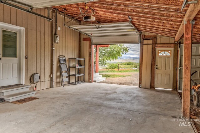 2445 Orchard Rd, Council, ID 83612 - garage featuring a garage door opener