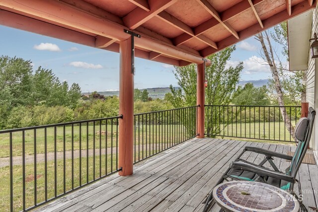 2445 Orchard Rd, Council, ID 83612 - wooden terrace featuring a lawn