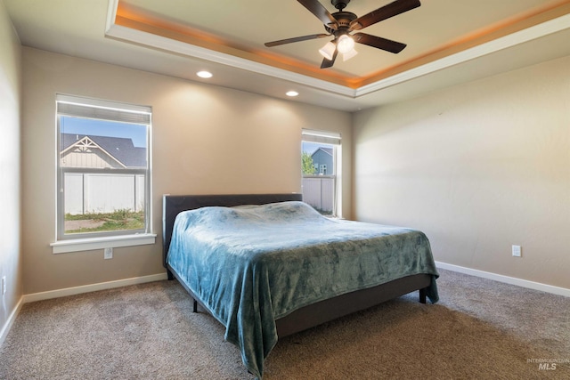 2448 Village St, Twin Falls, ID 83301 - carpeted bedroom with a raised ceiling, recessed lighting, baseboards, and a ceiling fan