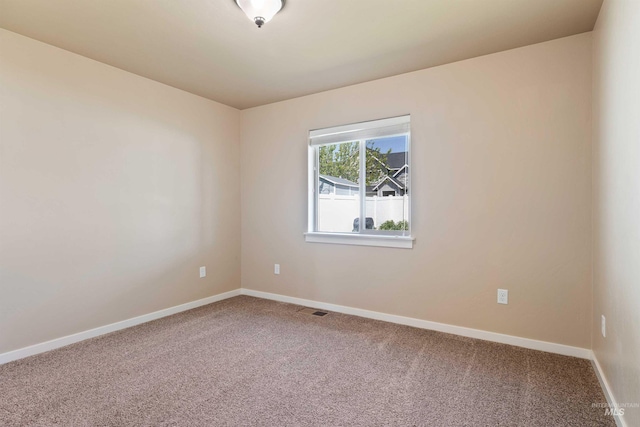 2448 Village St, Twin Falls, ID 83301 - spare room with carpet flooring and baseboards