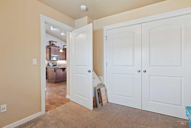 2448 Village St, Twin Falls, ID 83301 - bedroom with light colored carpet, a closet, and baseboards