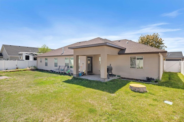 2448 Village St, Twin Falls, ID 83301 - rear view of house featuring a patio and a shingled roof