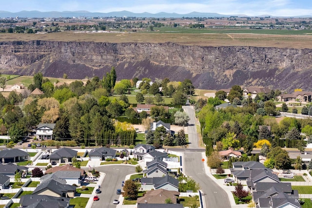 2448 Village St, Twin Falls, ID 83301 - aerial overview of property's location featuring nearby suburban area and mountains