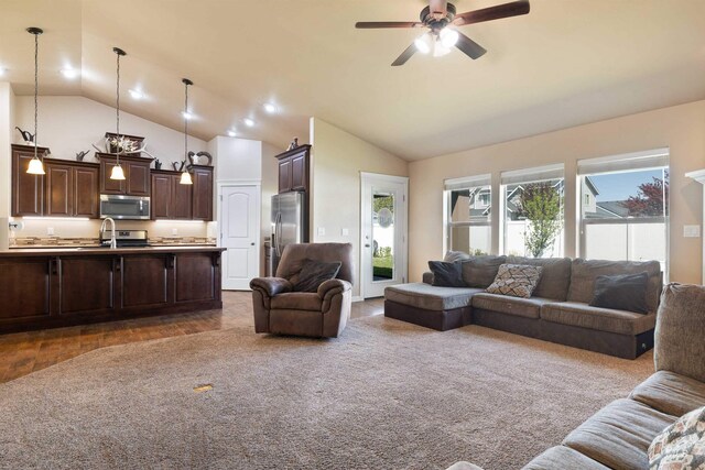 2448 Village St, Twin Falls, ID 83301 - living room with ceiling fan, wood finished floors, and high vaulted ceiling