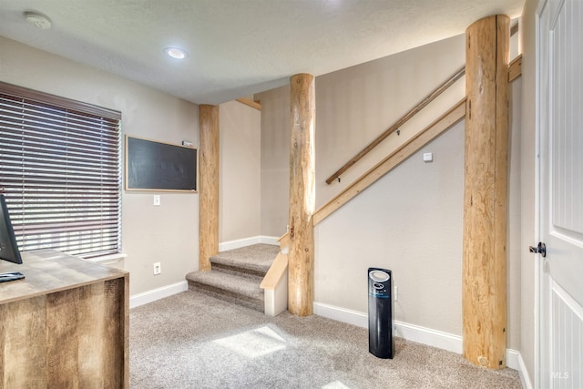 interior space with baseboards, carpet flooring, and recessed lighting