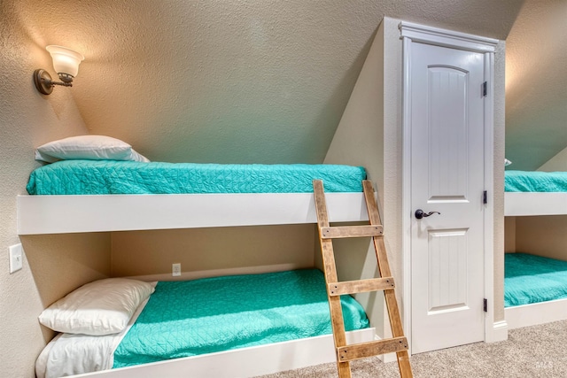 bedroom featuring carpet