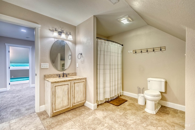 full bathroom featuring vaulted ceiling, toilet, vanity, baseboards, and a textured ceiling