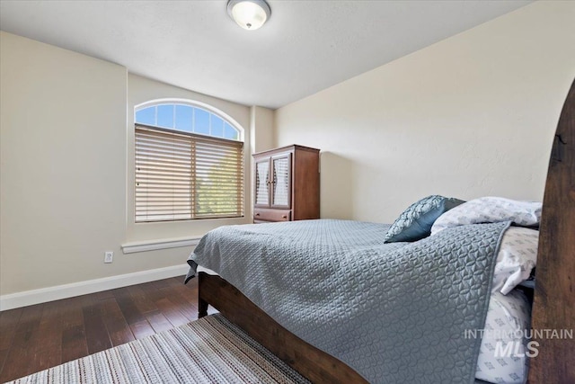 4680 N Maplestone Ave, Meridian, ID 83646 - bedroom featuring hardwood / wood-style floors and baseboards