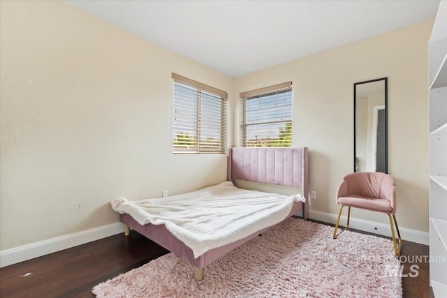 4680 N Maplestone Ave, Meridian, ID 83646 - bedroom with baseboards and wood finished floors