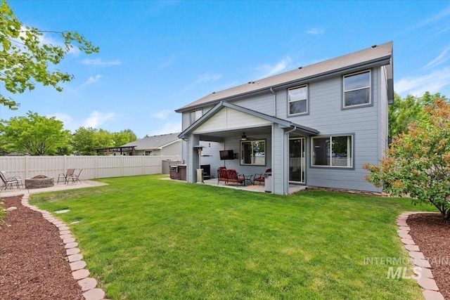 4680 N Maplestone Ave, Meridian, ID 83646 - back of property featuring an outdoor fire pit, a patio area, and ceiling fan