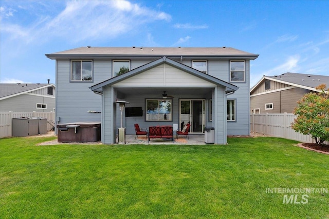 4680 N Maplestone Ave, Meridian, ID 83646 - rear view of house featuring ceiling fan, a hot tub, and a patio