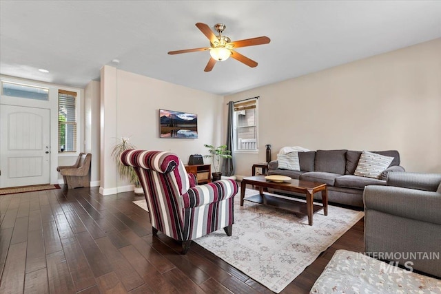 4680 N Maplestone Ave, Meridian, ID 83646 - living room with plenty of natural light, a ceiling fan, dark wood-type flooring, and baseboards