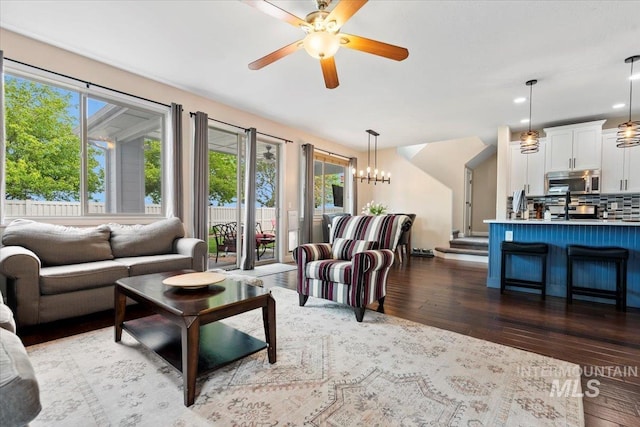 4680 N Maplestone Ave, Meridian, ID 83646 - living room featuring healthy amount of natural light, wood finished floors, ceiling fan, and recessed lighting