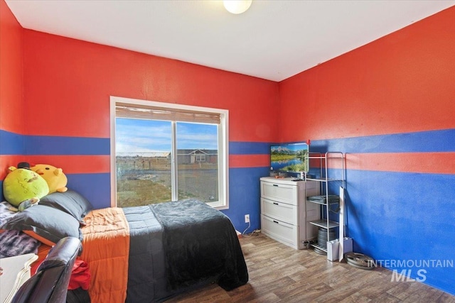 3834 N 2381 E, Filer, ID 83328 - bedroom featuring wood finished floors
