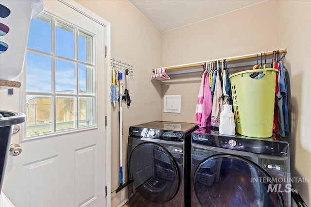 3834 N 2381 E, Filer, ID 83328 - washroom with separate washer and dryer and a textured ceiling