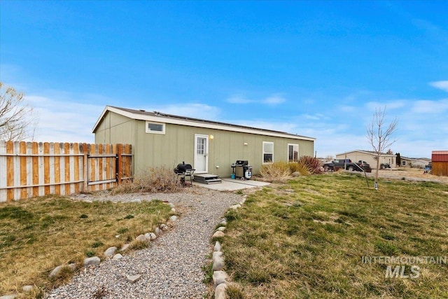 3834 N 2381 E, Filer, ID 83328 - rear view of house featuring a patio area