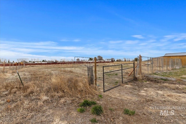 3834 N 2381 E, Filer, ID 83328 - view of yard featuring fence, a rural view, and a gate