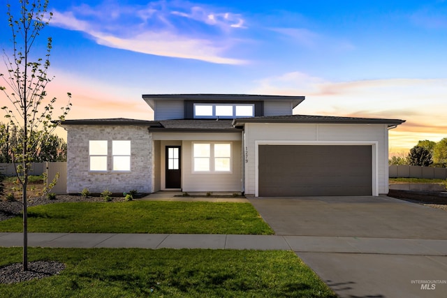1279 E Andes Dr, Kuna, ID 83634 - prairie-style house with an attached garage and driveway