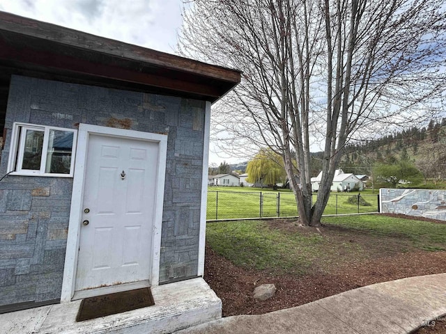 139 119th St, Orofino, ID 83544 - property entrance featuring a yard and fence