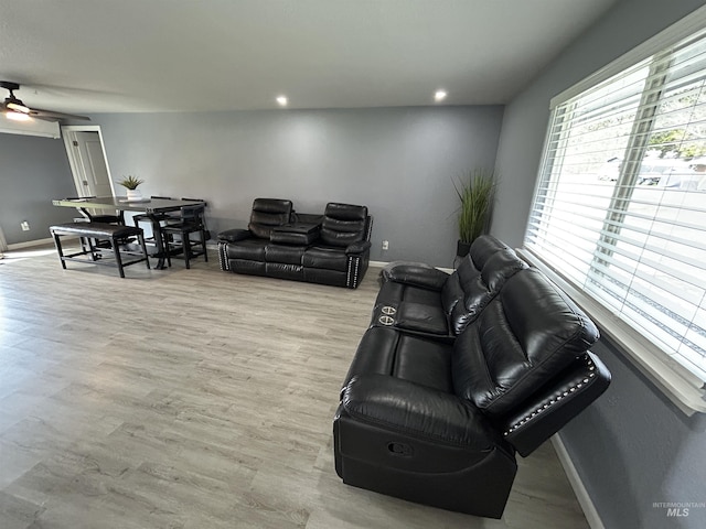 139 119th St, Orofino, ID 83544 - living room with wood finished floors, ceiling fan, and baseboards
