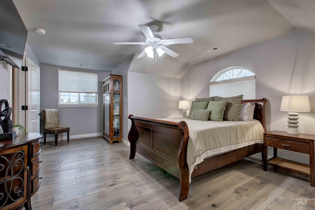3330 E 4050 N, Twin Falls, ID 83301 - bedroom featuring visible vents, baseboards, wood finished floors, and lofted ceiling