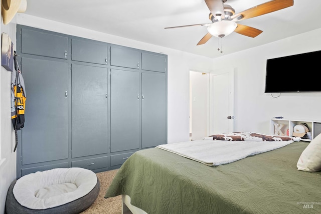 bedroom featuring a closet, carpet flooring, and ceiling fan