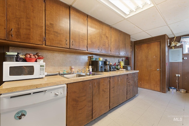 8662 State Highway 78, Marsing, ID 83639 - kitchen with white appliances, light countertops, a paneled ceiling, electric panel, and a sink
