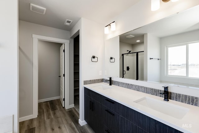 4372 N Magical Creek Ave, Meridian, ID 83646 - full bathroom featuring a sink, visible vents, and a stall shower