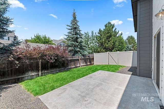 1447 N Pineview Ln, Boise, ID 83713 - fenced backyard with a patio