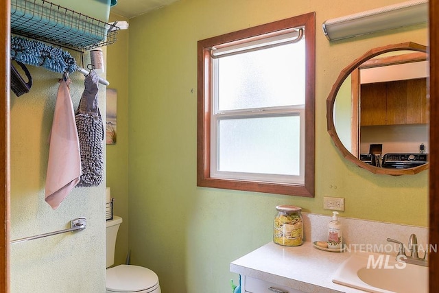 1021 E 5th St, Moscow, ID 83843 - bathroom featuring toilet and vanity