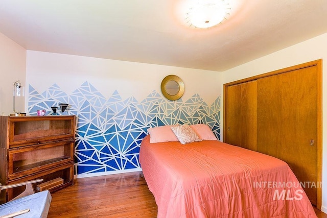 1021 E 5th St, Moscow, ID 83843 - bedroom with wood finished floors and a closet