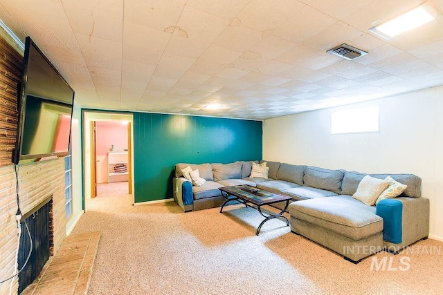 1021 E 5th St, Moscow, ID 83843 - living area featuring carpet and a fireplace