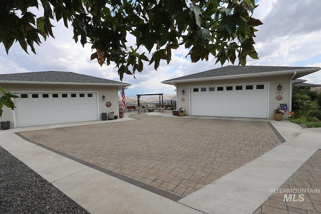 view of front of property with a garage