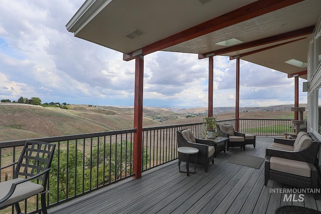 deck featuring a mountain view