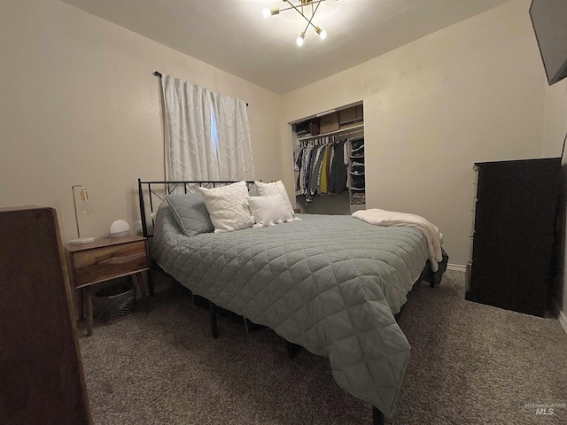 bedroom featuring dark carpet and a closet