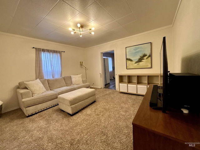 living room with crown molding and carpet