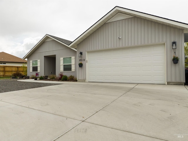 808 Adell Ave, Filer, ID 83328 - single story home with board and batten siding, driveway, and a garage