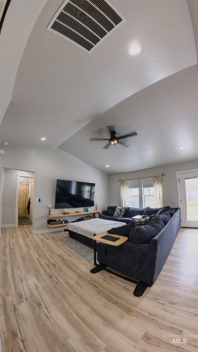 808 Adell Ave, Filer, ID 83328 - living room with ceiling fan, lofted ceiling, light wood finished floors, and visible vents