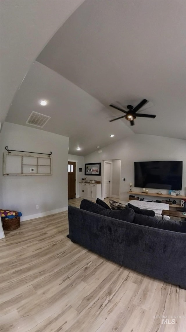 808 Adell Ave, Filer, ID 83328 - living room with visible vents, a ceiling fan, light wood-type flooring, and lofted ceiling